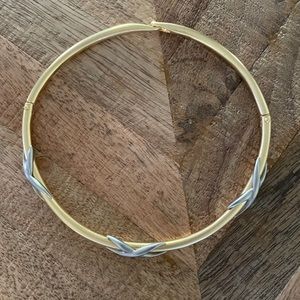 Unique round necklace. Gold with silver accents.